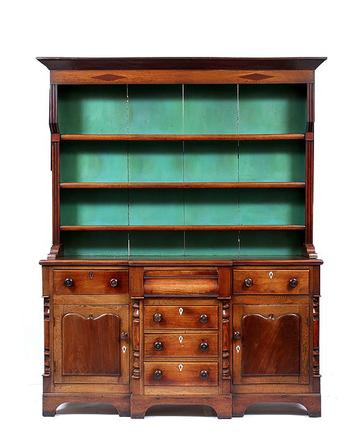 Appraisal: A VICTORIAN OAK AND MAHOGANY BREAK FRONT DRESSER the plate