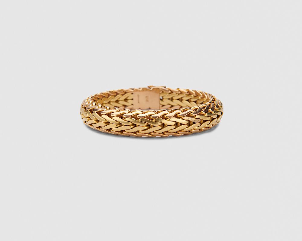 Appraisal: K Gold Bracelet K Gold Bracelet of flattened fixed wheat