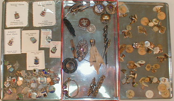 Appraisal: Silver and white metal brooches charm bracelets etc together with