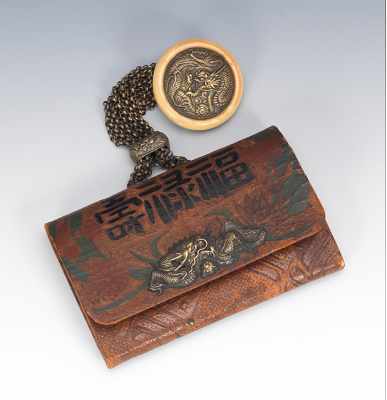 Appraisal: A Japanese Tobacco Pouch with Kagamibuta Netsuke Toggle Rectangular tobacco