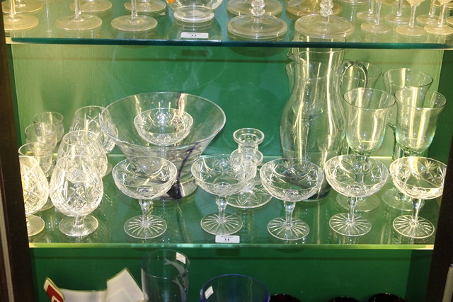 Appraisal: A SET OF SIX CUT GLASS CHAMPAGNE GLASSES a studio