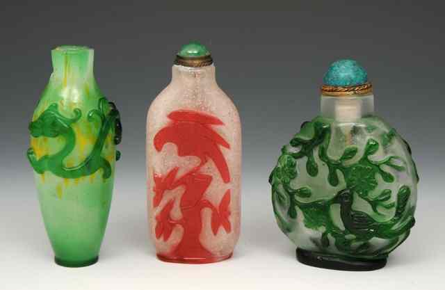 Appraisal: THREE CHINESE BEJIING CAMEO GLASS SNUFF BOTTLES of flattened rounded