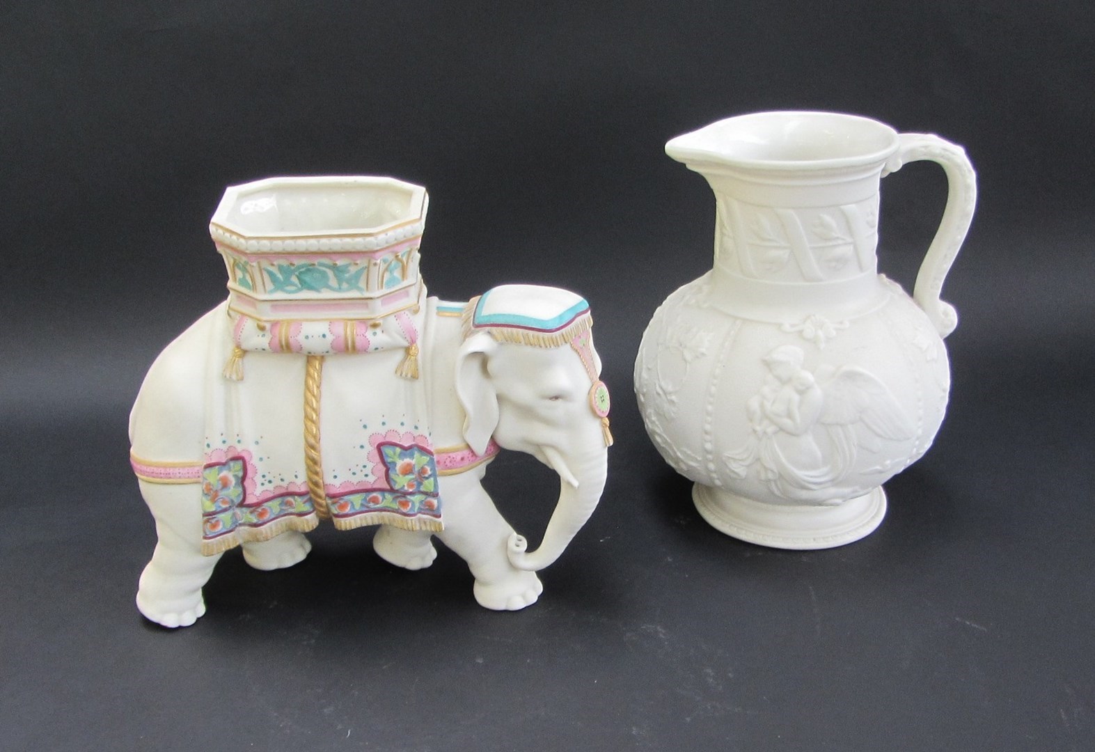 Appraisal: A Royal Worcester parian elephant modelled by James Hadley wearing