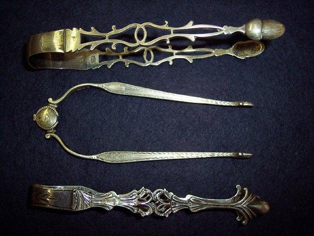 Appraisal: A pair of George III bright cut sprung sugar tongs