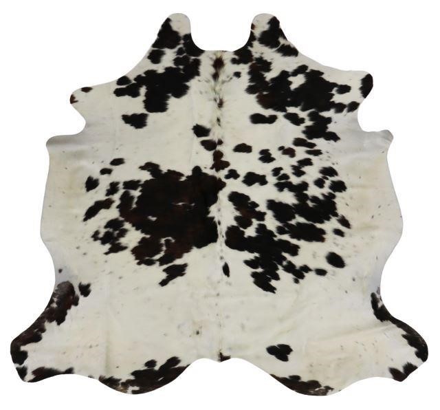 Appraisal: Large cow hide white and brown brindle retaining original maker's