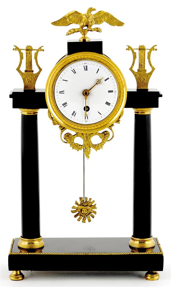 Appraisal: French onyx and parcel-gilt mantel clock circa rectangular plinth with