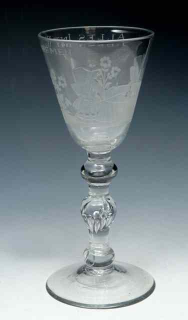 Appraisal: A FUNNEL BOWL GOBLET engraved with drinking scene and 'Alles