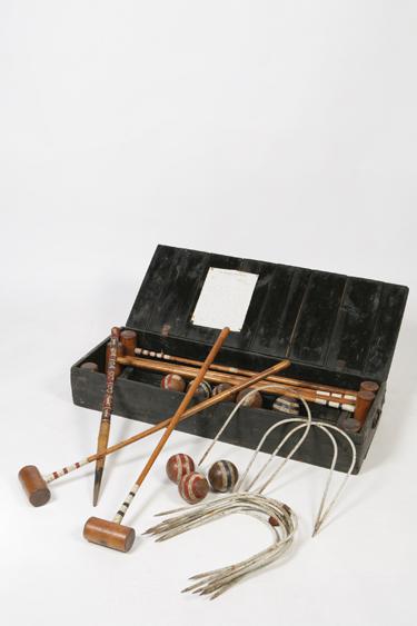 Appraisal: A CROQUET SET comprising eight mallets eight balls two pegs