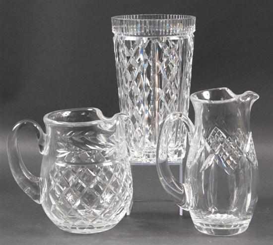 Appraisal: Two molded crystal pitchers and similar vase possibly Waterford Estimate