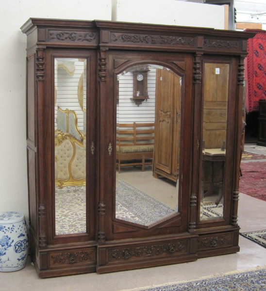 Appraisal: THREE-DOOR BREAKFRONT WALNUT WARDROBE Austrian or German th century having