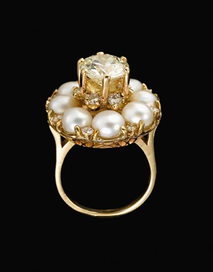 Appraisal: karat yellow gold pearl and diamond cocktail ring carat round