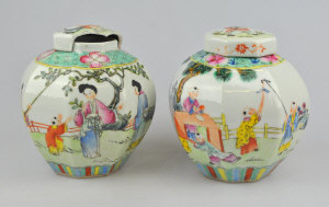 Appraisal: A pair of Chinese famille rose octagonal pots and covers