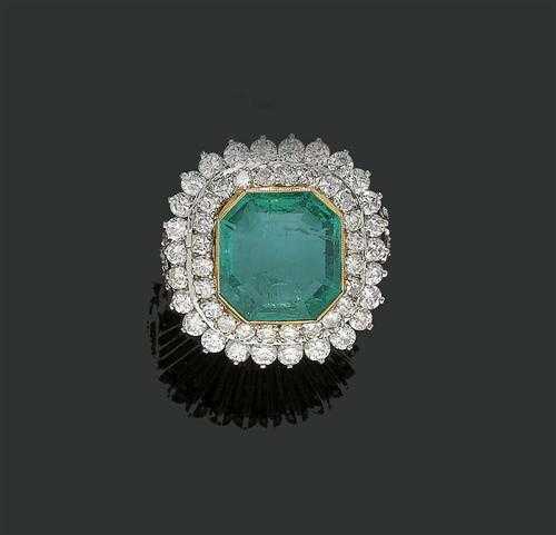 Appraisal: EMERALD AND DIAMOND RING ca Platinum and ros gold Elegant