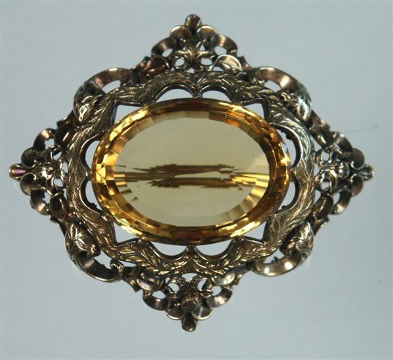 Appraisal: LARGE YELLOW GOLD AND CITRINE BROOCH total weight of brooch