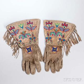 Appraisal: Plains Plateau Beaded Hide Gauntlets c with multicolored floral designs