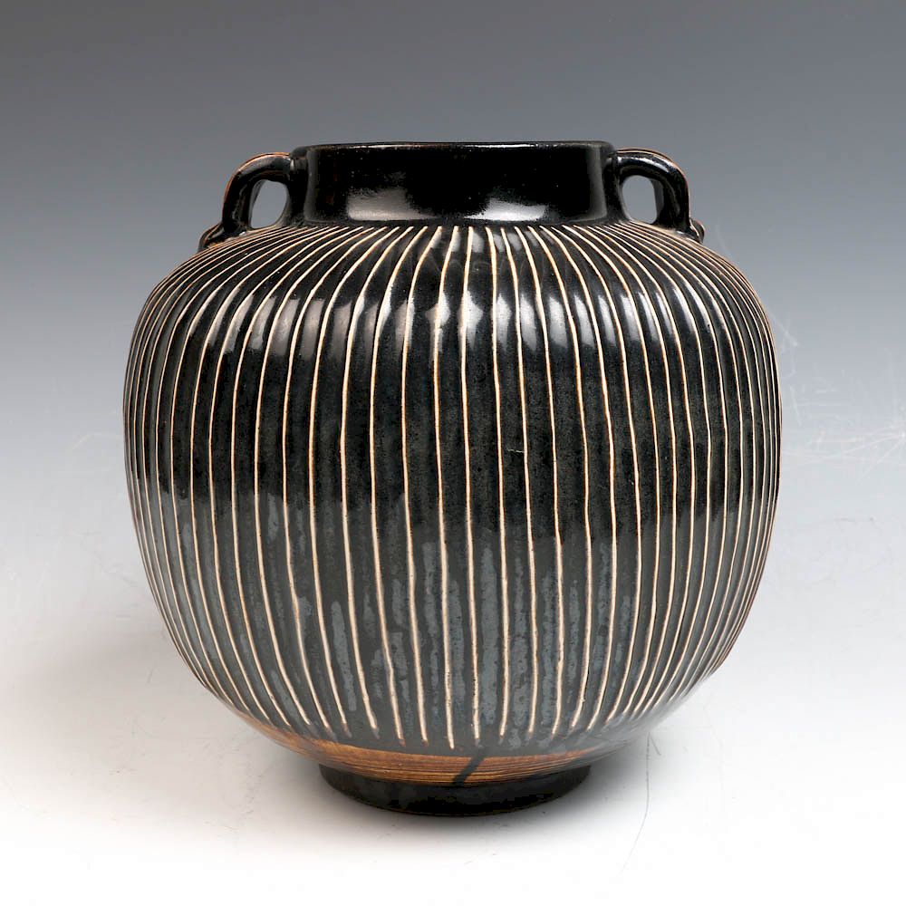 Appraisal: LARGE CHINESE BLACK WHITE RIBBED JAR SONG DYNASTY of compressed