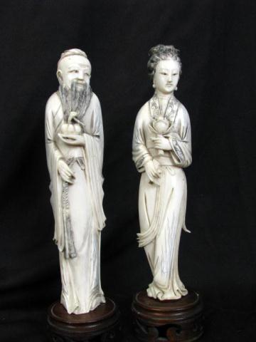 Appraisal: Pair of Asian carved ivory figures inches high with stand