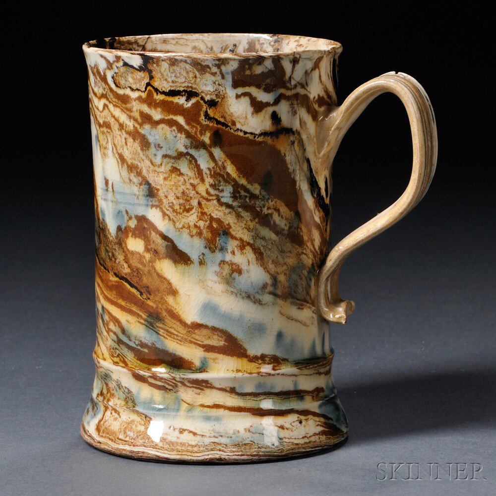 Appraisal: Staffordshire Solid Agate Tankard England c cylindrical shape with strap