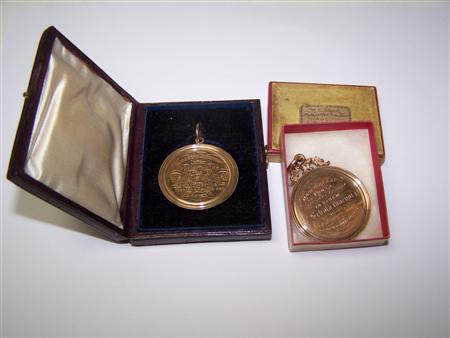 Appraisal: Two gold School prize medallions unmarked each of simple circular