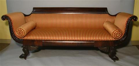 Appraisal: AMERICAN EMPIRE STYLE MAHOGANY SOFA The rectangular crest above out