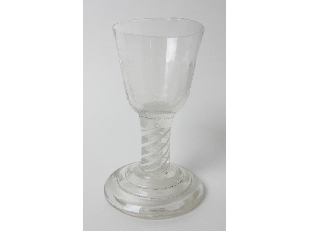 Appraisal: An th Century opaque airtwist stem firing glass the fluted