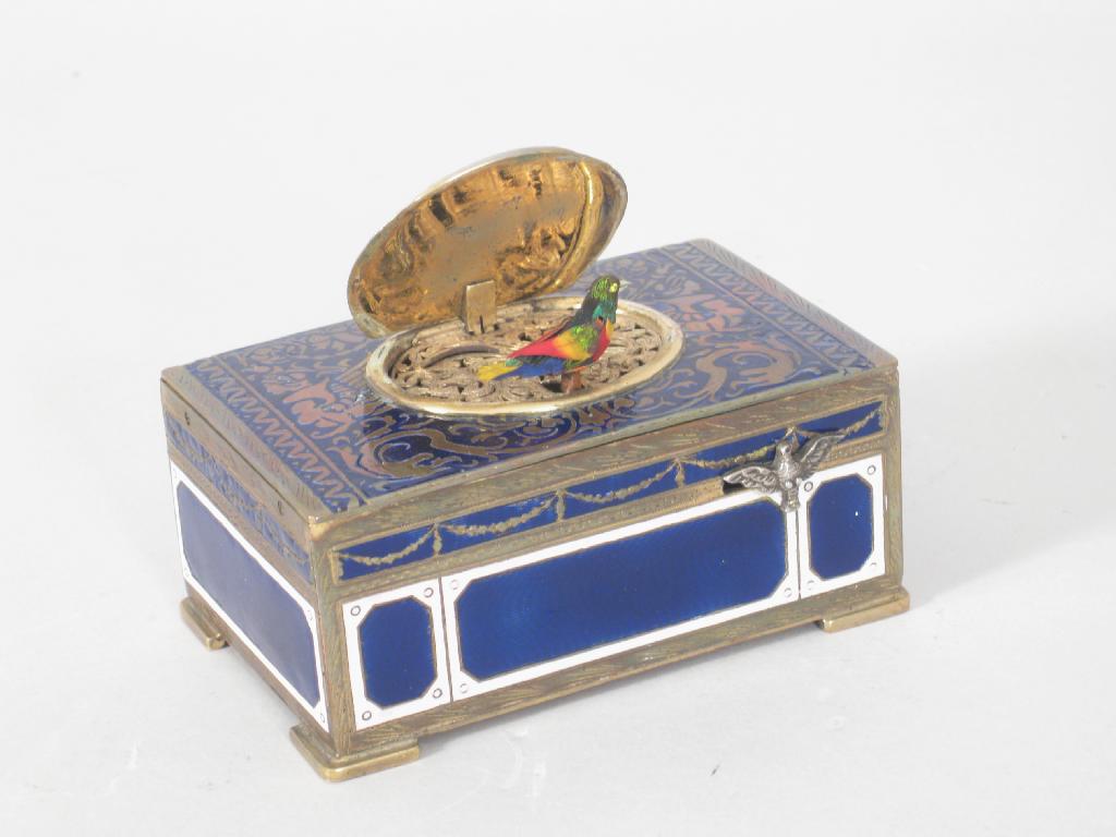 Appraisal: An Edwardian Continental Musical Singing Bird Box in blue and