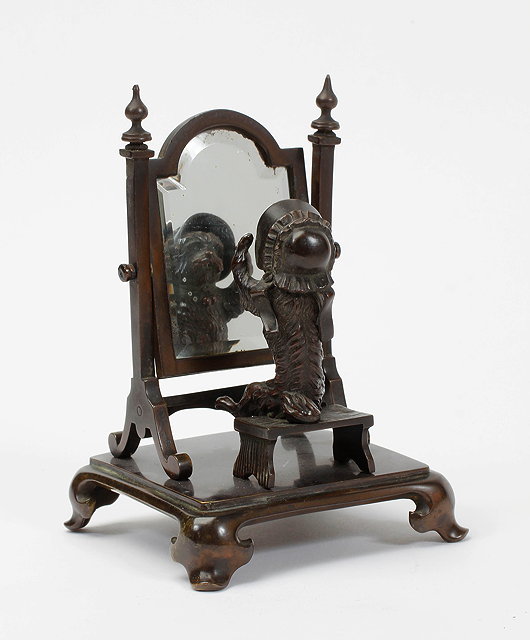 Appraisal: A HUMOROUS CONTINENTAL BRONZE ORNAMENT in the form of a