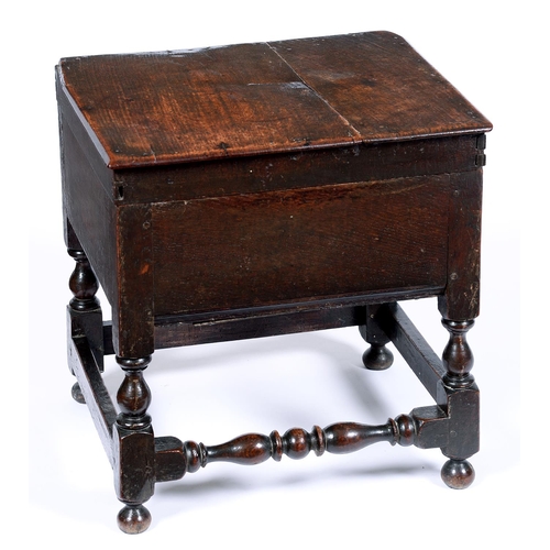 Appraisal: A joined oak close stool th c the boarded lid