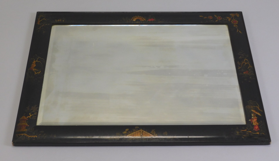 Appraisal: An early thC black japanned rectangular wall mirror the frame