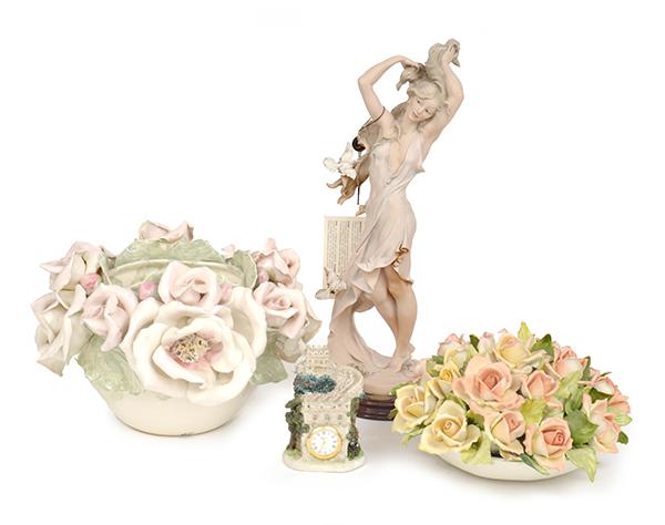 Appraisal: TWO CERAMIC FLORAL GROUPS A GIUSEPPE ARMANI RESIN FIGURE AND