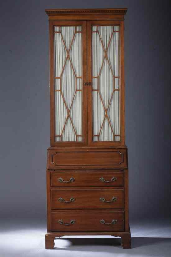 Appraisal: GEORGE III STYLE MAHOGANY SECRETARY BOOKCASE Of slim proportions Flat