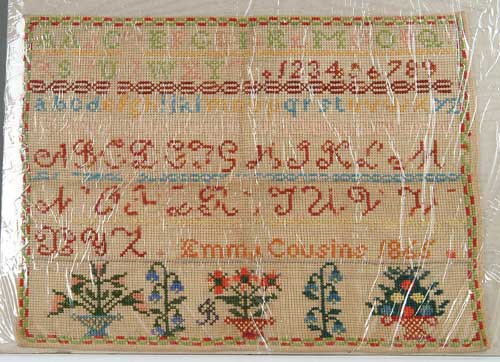 Appraisal: UNFRAMED SAMPLER BY EMMA COUSINS Alpha-numeric rows and bottom border