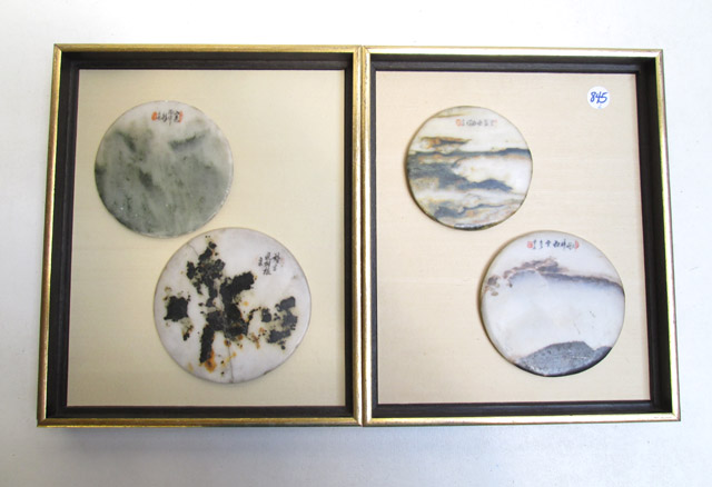 Appraisal: TWO PAIRS OF HARDSTONE ORIENTAL DISCS framed in gilt edge