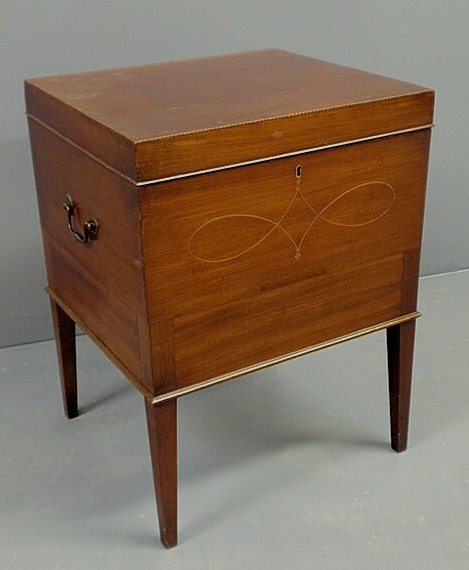 Appraisal: English inlaid mahogany cellarette with brass handles and square tapered