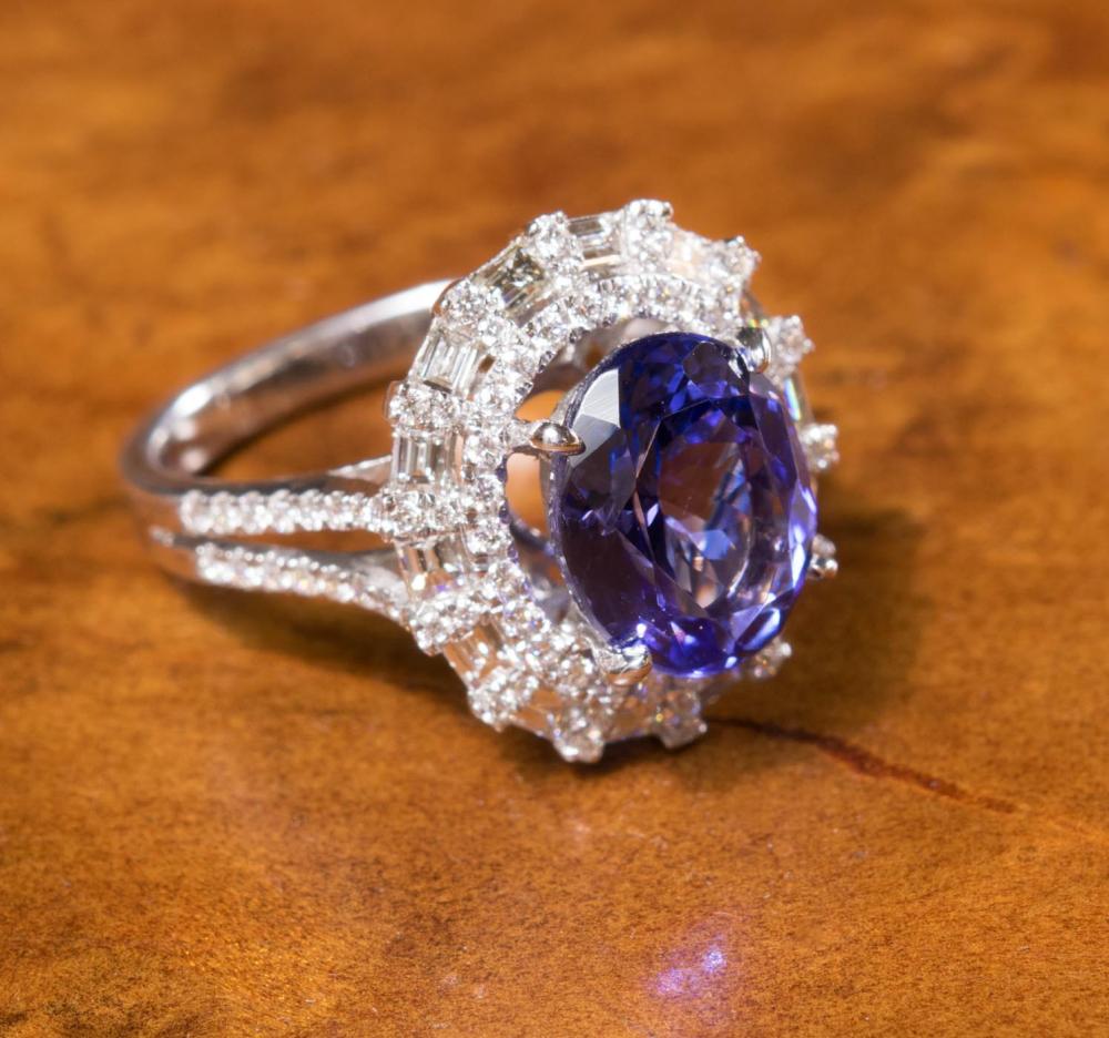 Appraisal: TANZANITE DIAMOND AND EIGHTEEN KARAT WHITE GOLD COCKTAIL RING featuring