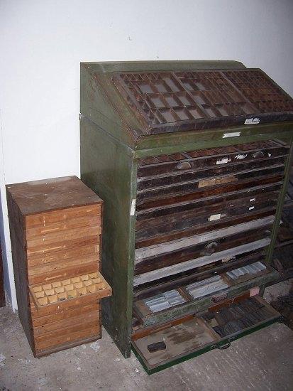 Appraisal: A typesetter's tin cabinet labelled Butler fitted narrow drawers with