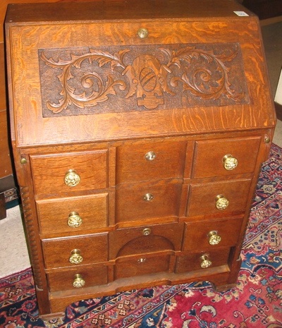 Appraisal: CARVED OAK BLOCK-FRONT DESK English late th century having a