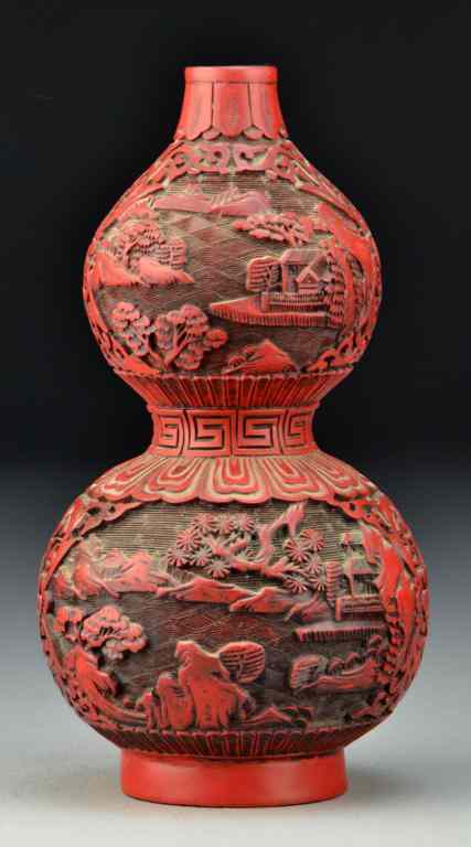 Appraisal: Chinese Cinnabar Double Gourd VaseFinely carved to depict buildings within