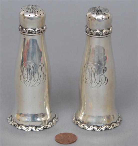 Appraisal: A PAIR OF STERLING SILVER SALT AND PEPPER SHAKERS Having