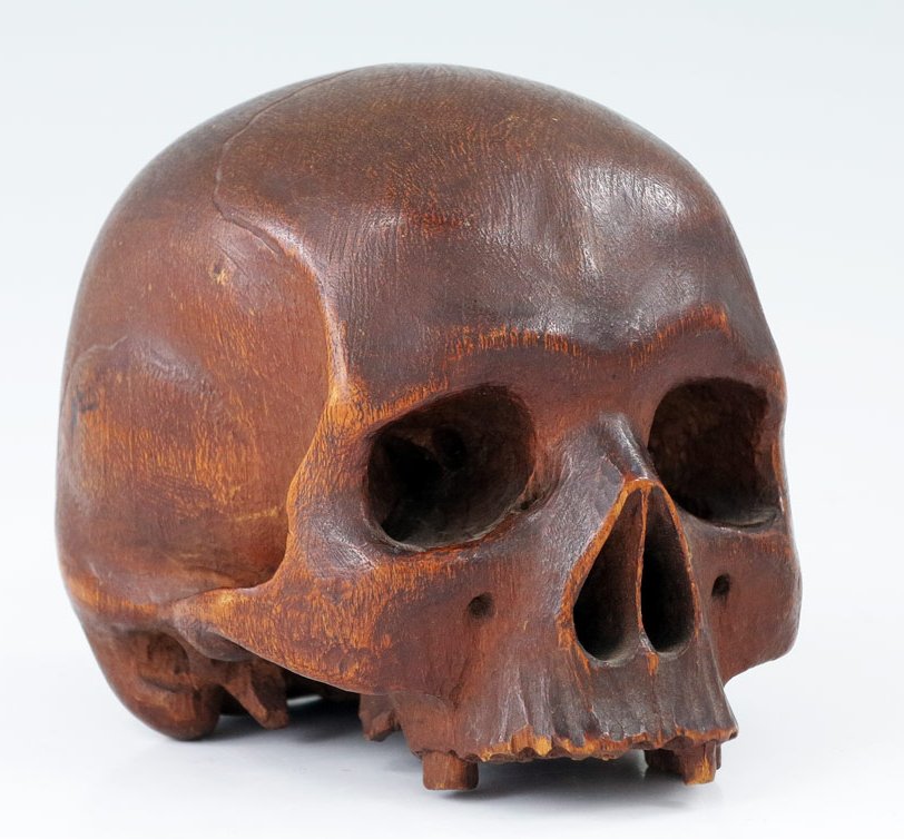 Appraisal: EARLY CARVED WOODEN SKULL Former collection of Benedictine monk ''