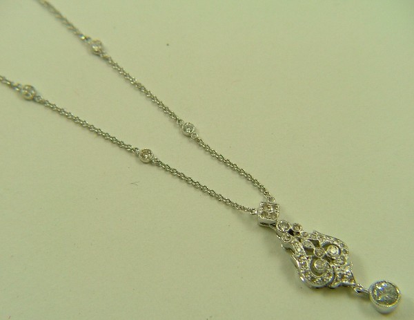 Appraisal: DIAMOND PENDANT NECKLACE K white gold pendant setting and chain