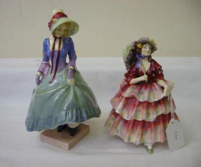 Appraisal: A ROYAL DOULTON FIGURE The Hinged Parasol HN with green