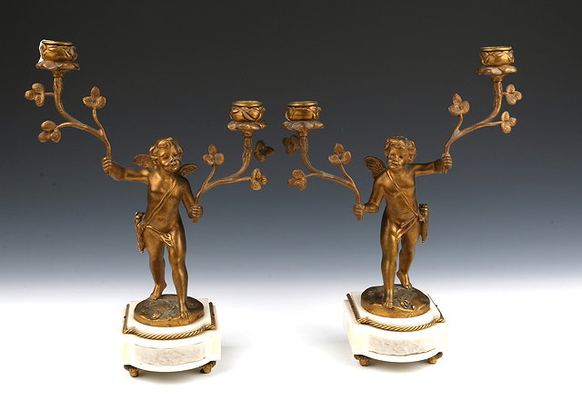 Appraisal: A PAIR OF FRENCH GILT METAL AND WHITE MARBLE TWO