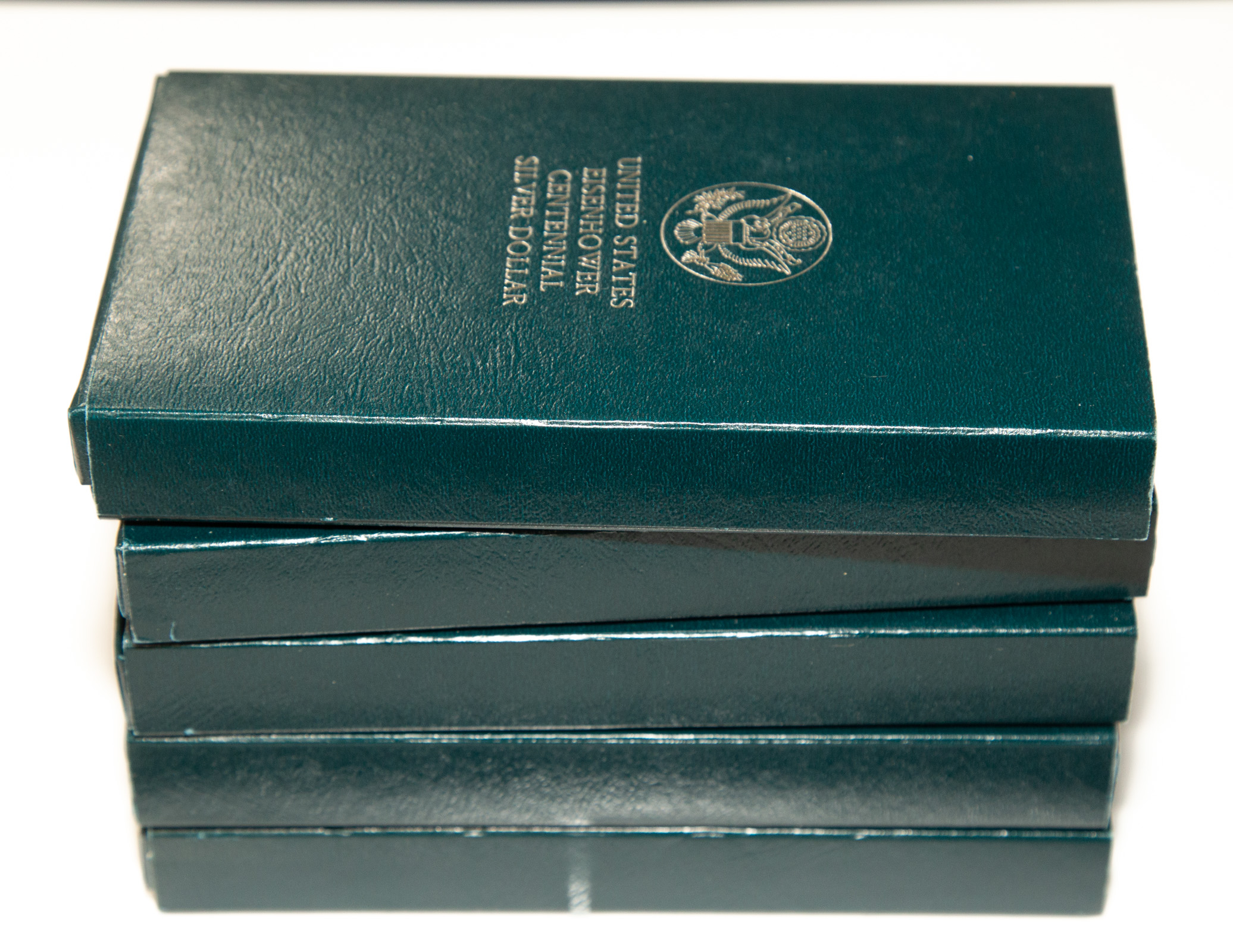 Appraisal: FIVE EISENHOWER CENTENNIAL PROOF SILVER DOLLARS In mint packaging with