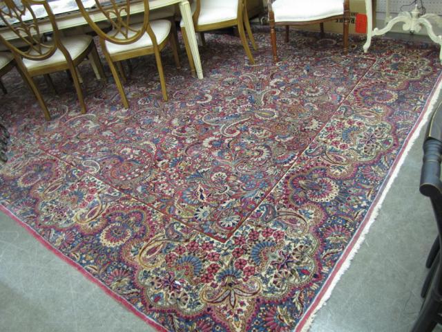 Appraisal: 's Persian Kerman Room Size Rug traditional pattern with red