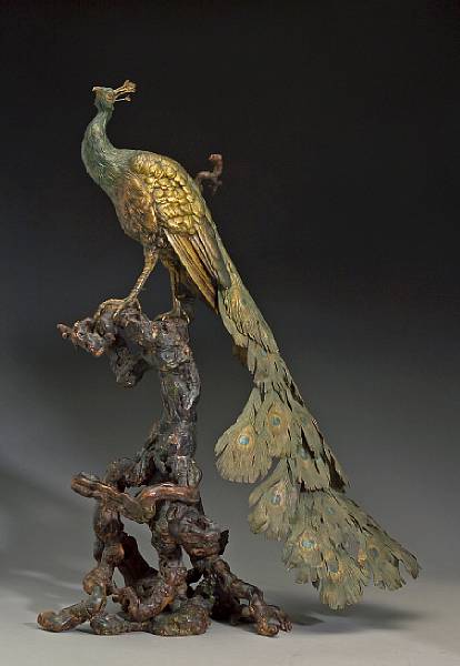 Appraisal: An imposing Austrian cold painted bronze figure of a peacock