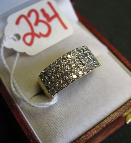 Appraisal: DIAMOND AND FOURTEEN KARAT GOLD RING set with pave' set