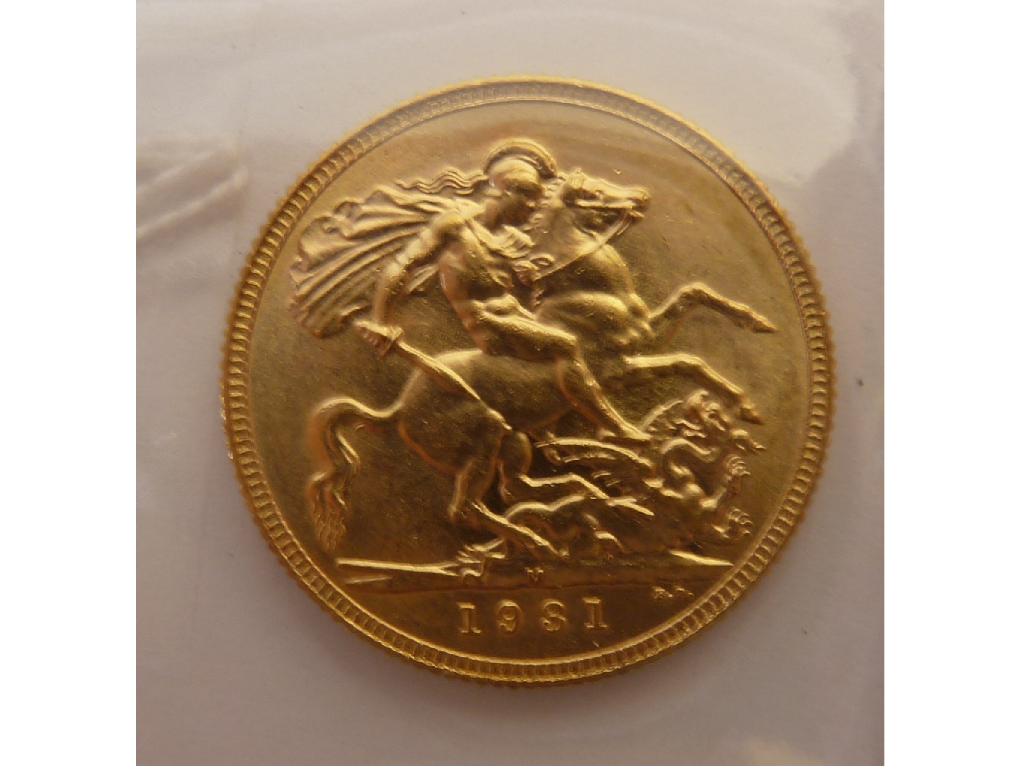 Appraisal: A GEORGE V GOLD SOVEREIGN small head Melbourne Mint -