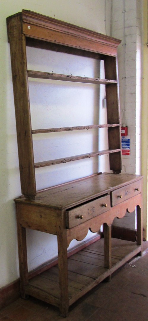 Appraisal: A th century pine dresser the open three tier plate