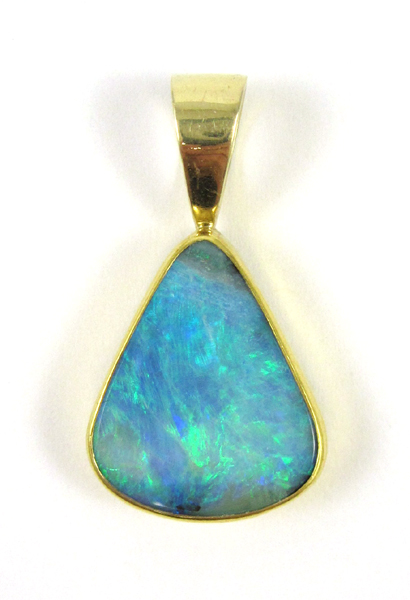 Appraisal: OPAL DOUBLET AND FOURTEEN KARAT GOLD PENDANT The yellow gold